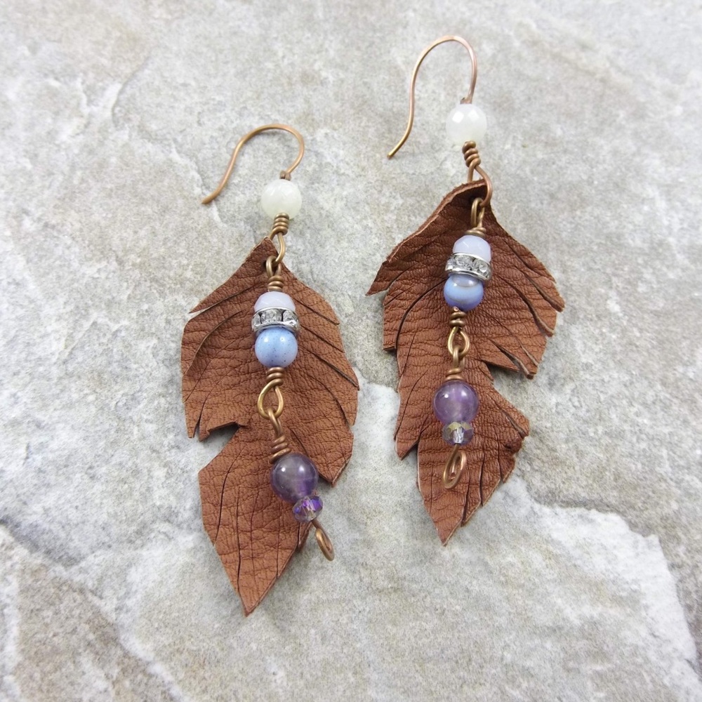 Brown leather feather earrings